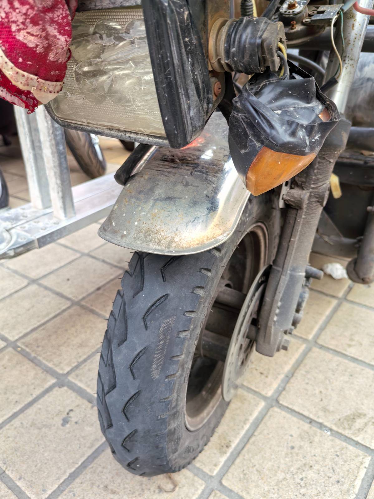 街头修车摊记事：给“老伙计”续命，重启风雨同行的奔赴